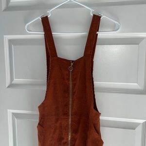 Super cute over all dress with pockets